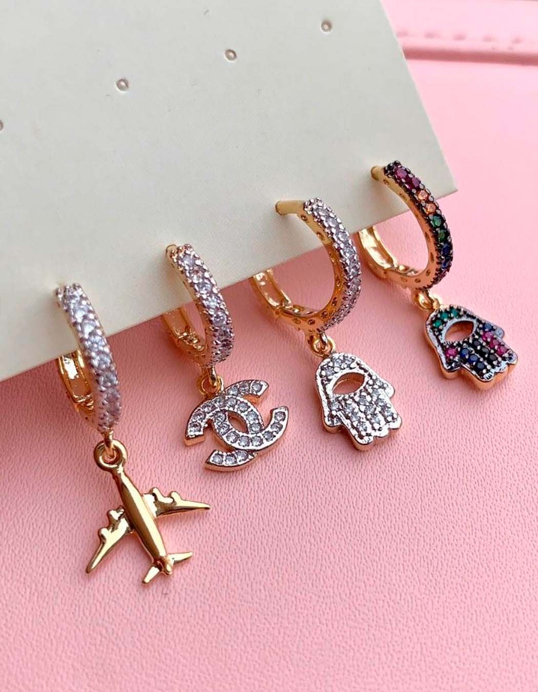 Brinco Argola Clips Avião cravejado com Zircônias banhado a Ouro 18k